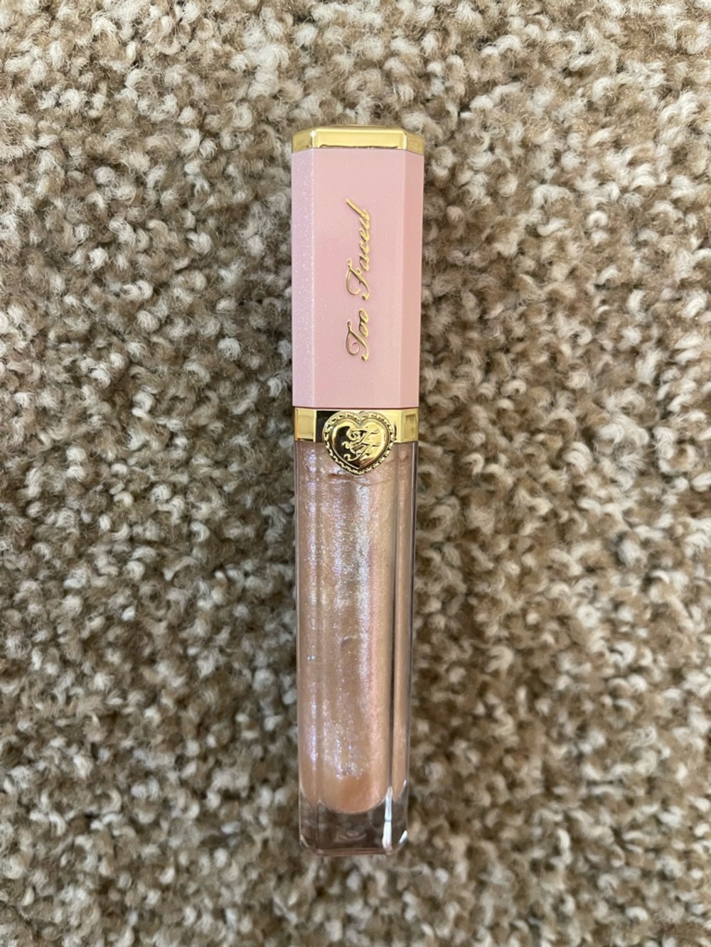 Too Faced Iridescent Pink Shimmer Lip Gloss in color Pants off, Dance off